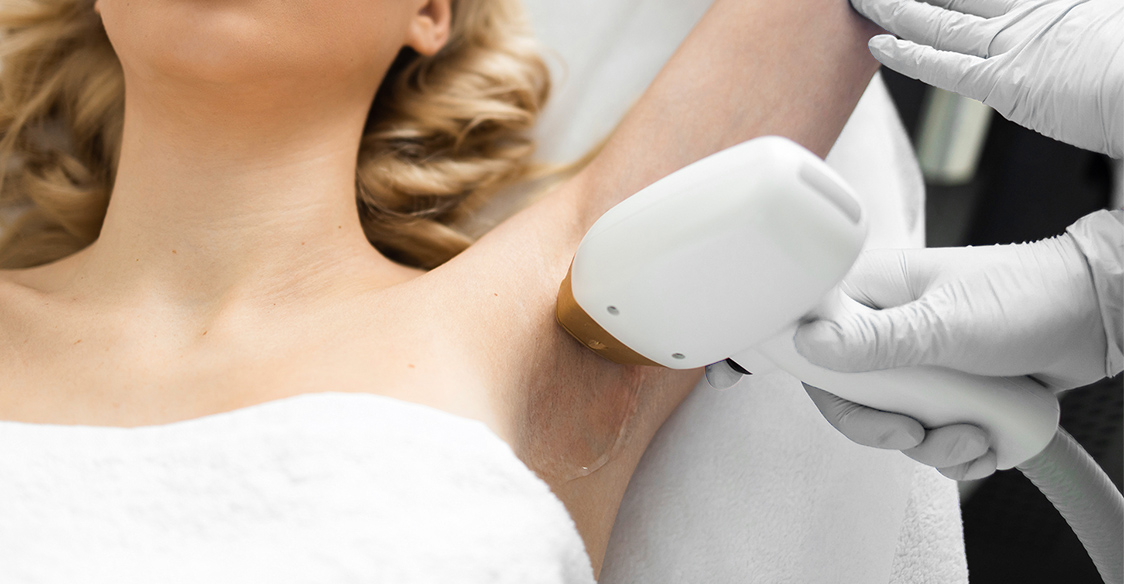 A dermapure physician treating a patient
