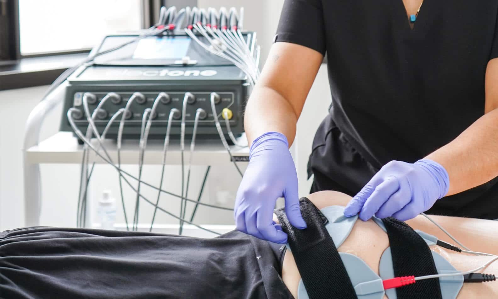 A dermapure physician treating a patient