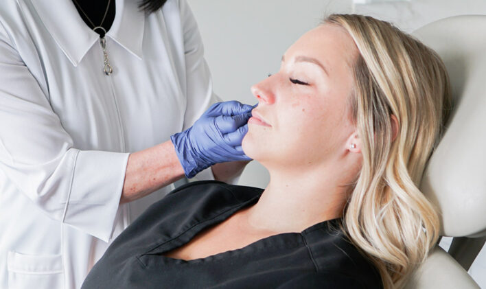 Blonde woman having Botox injections