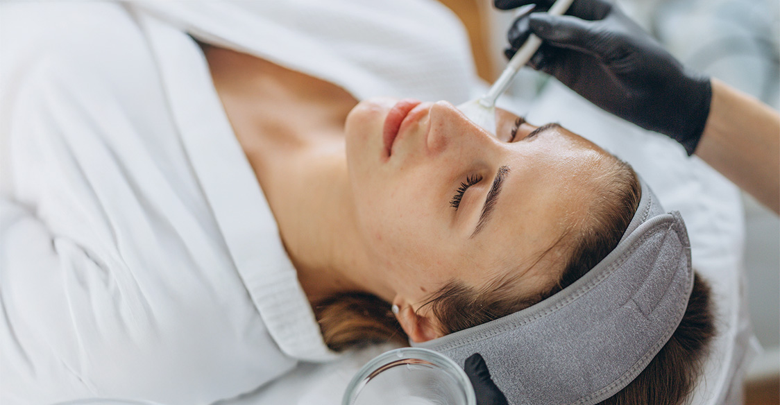 A dermapure physician treating a patient