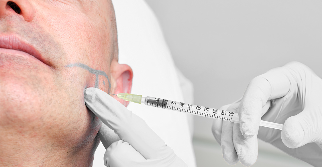A dermapure physician treating a patient