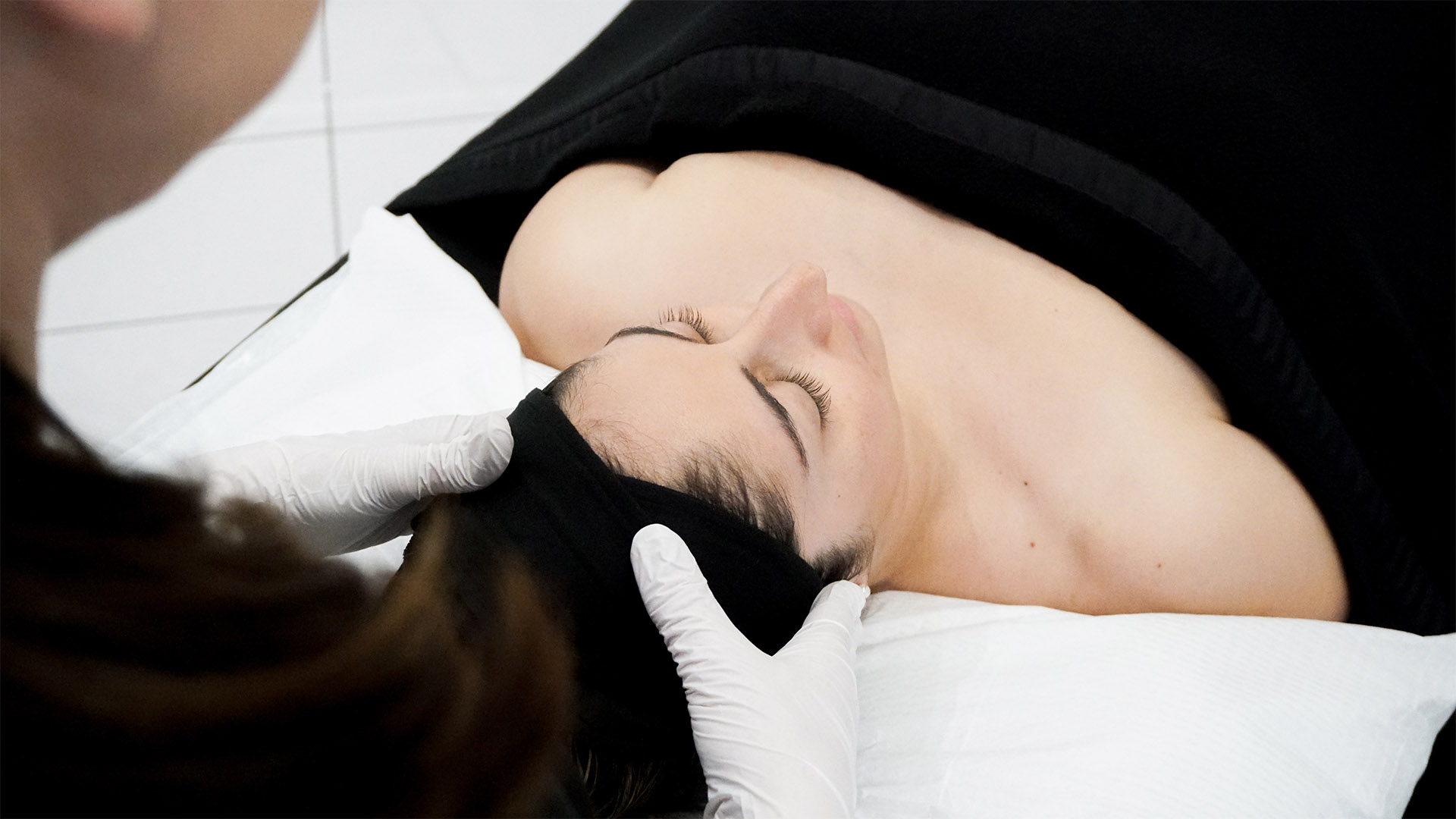 A dermapure physician treating a patient