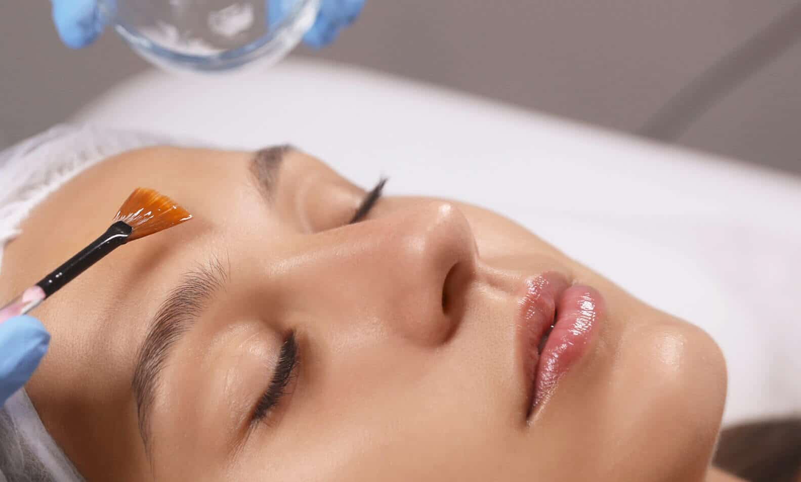 A dermapure physician treating a patient
