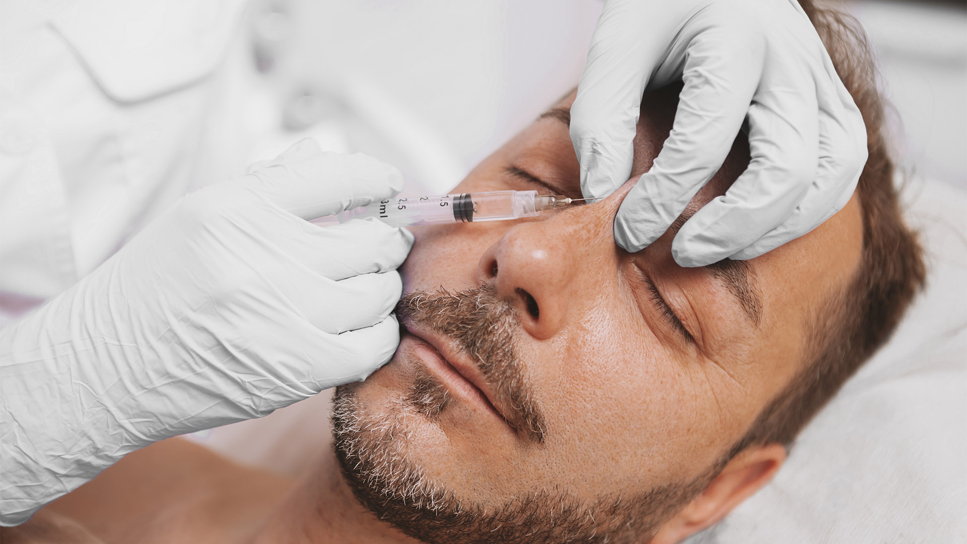 A dermapure physician treating a patient