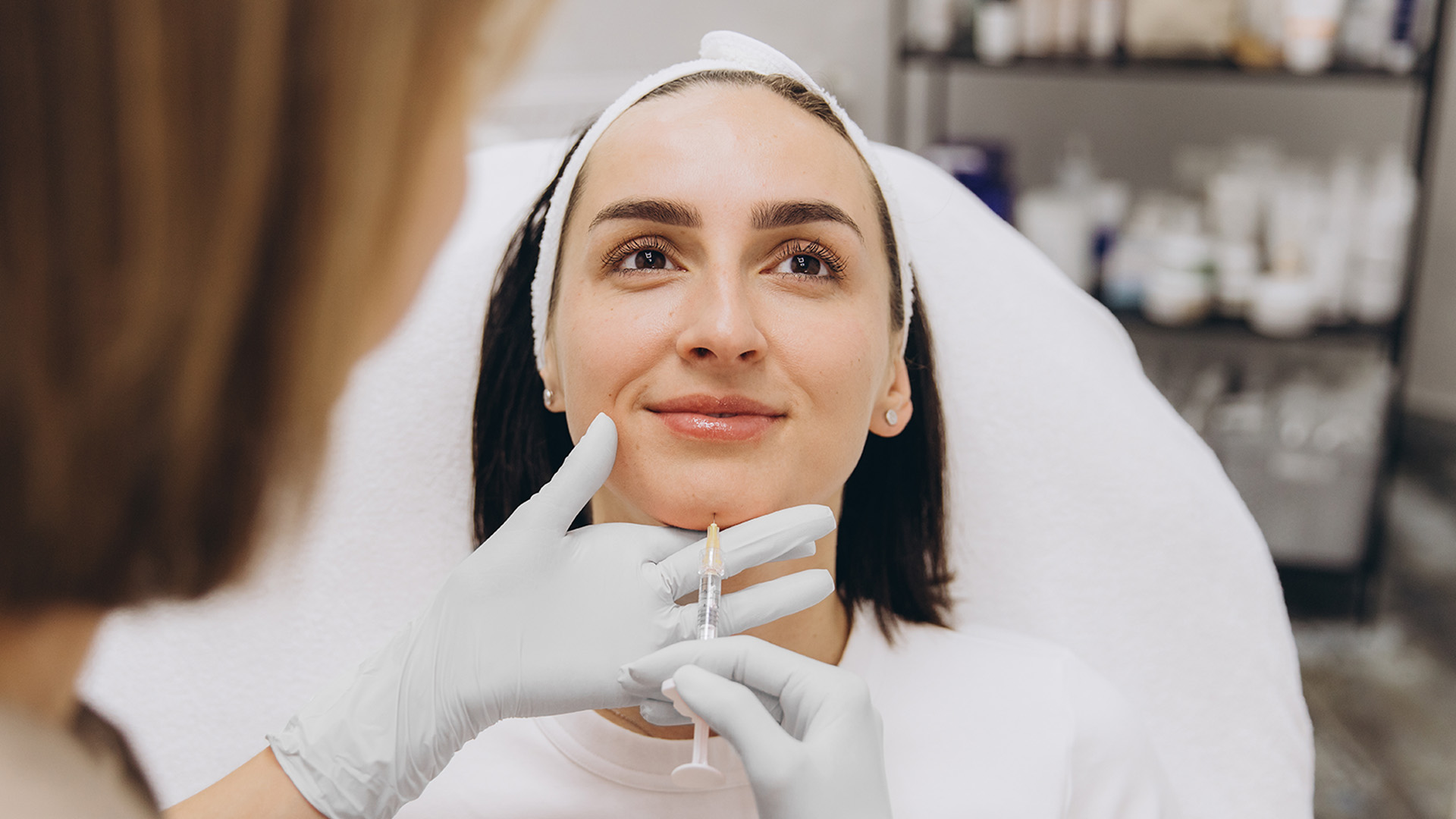 A dermapure physician treating a patient